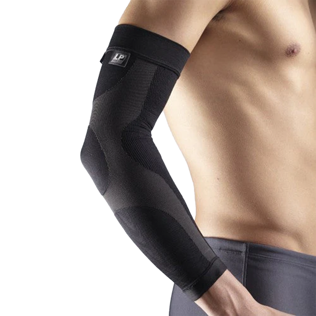 Black elbow compression sleeve on a person's arm with a white background