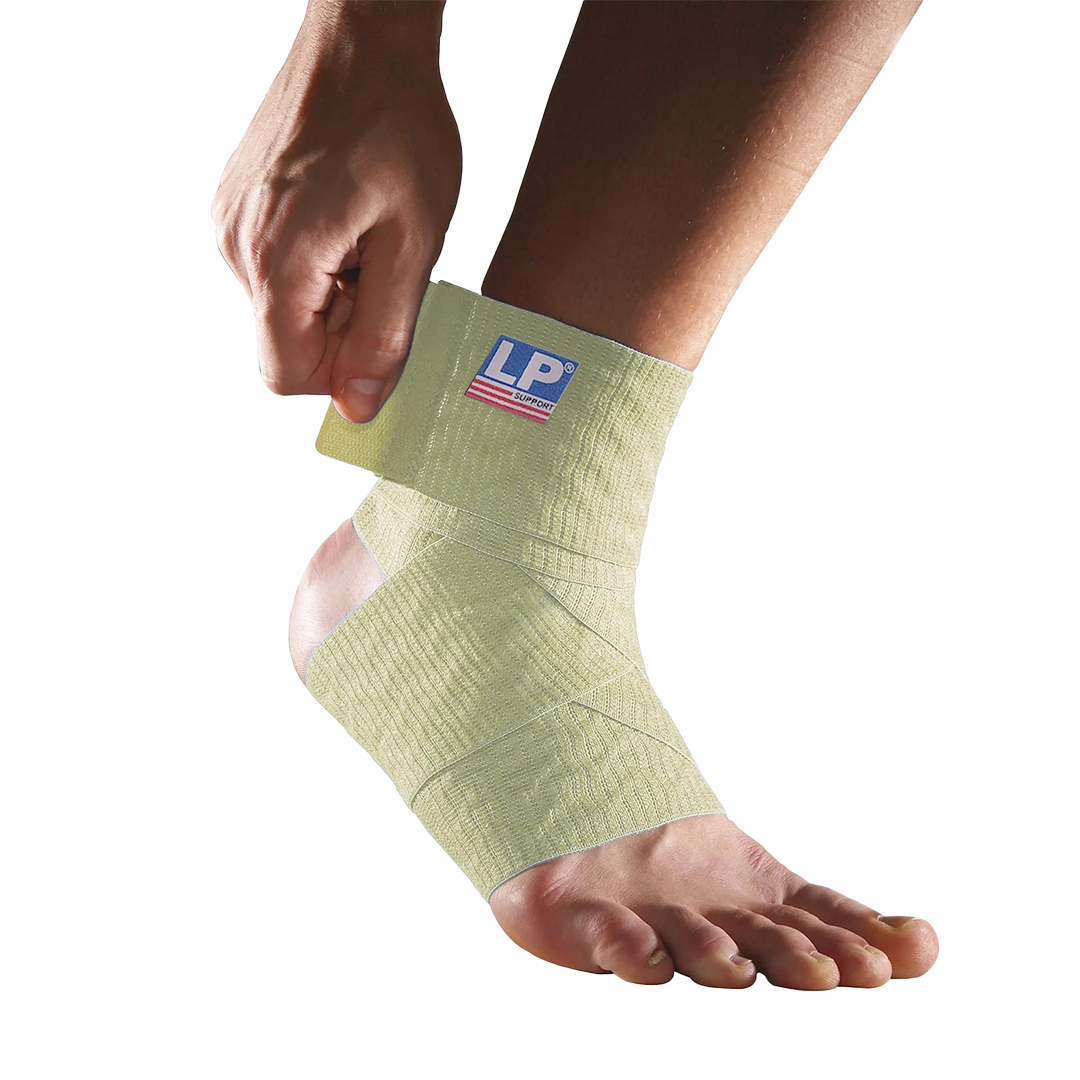 Person wearing a tan ankle support brace with LP brand logo on a white background