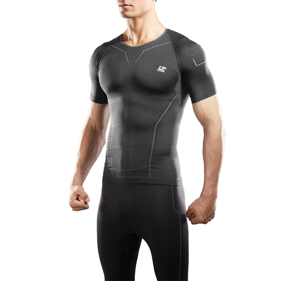Person wearing a black compression outfit on a white background
