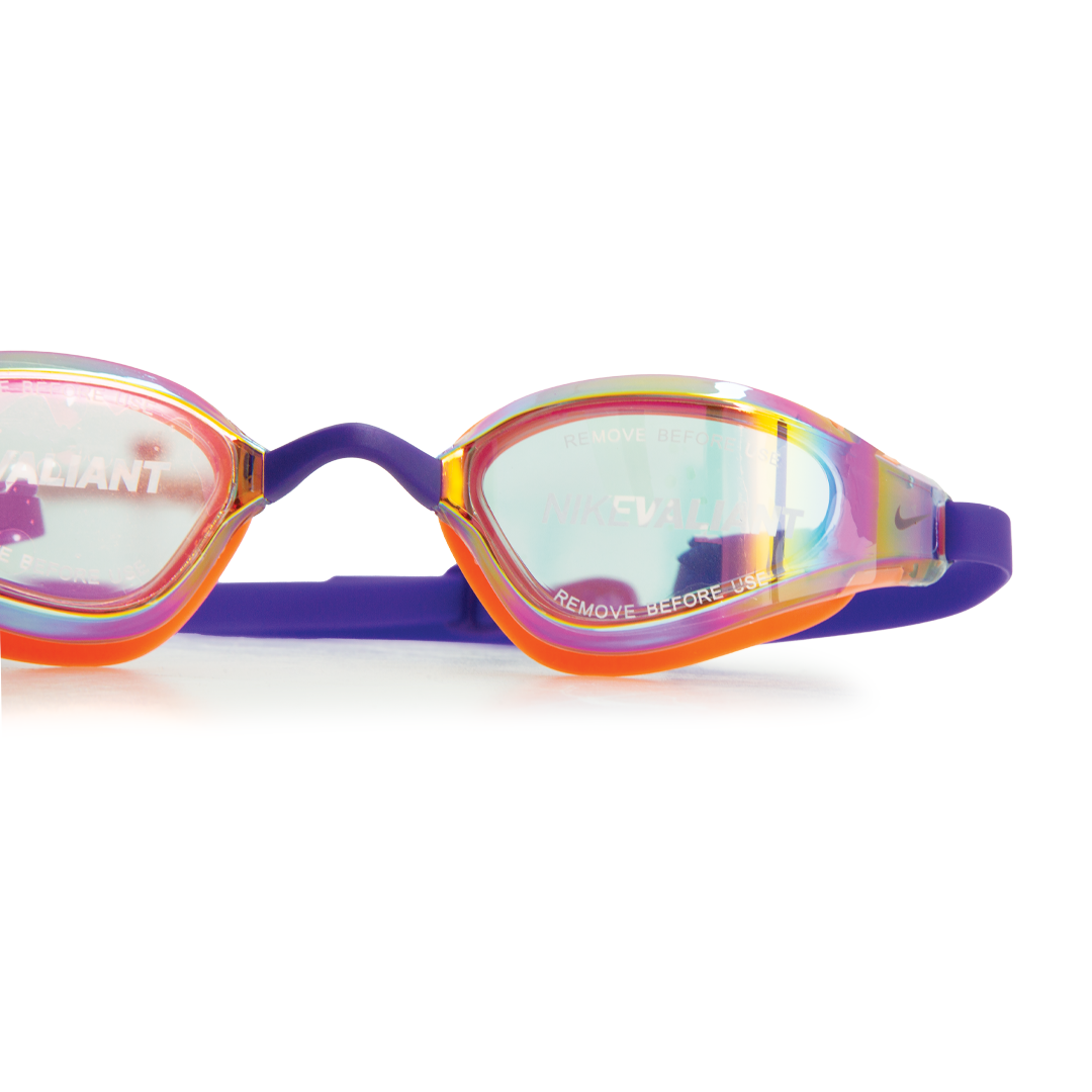 Multicolored swim goggles on a white background