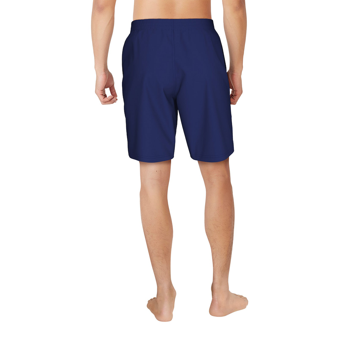 Person wearing navy blue swim shorts on a white background