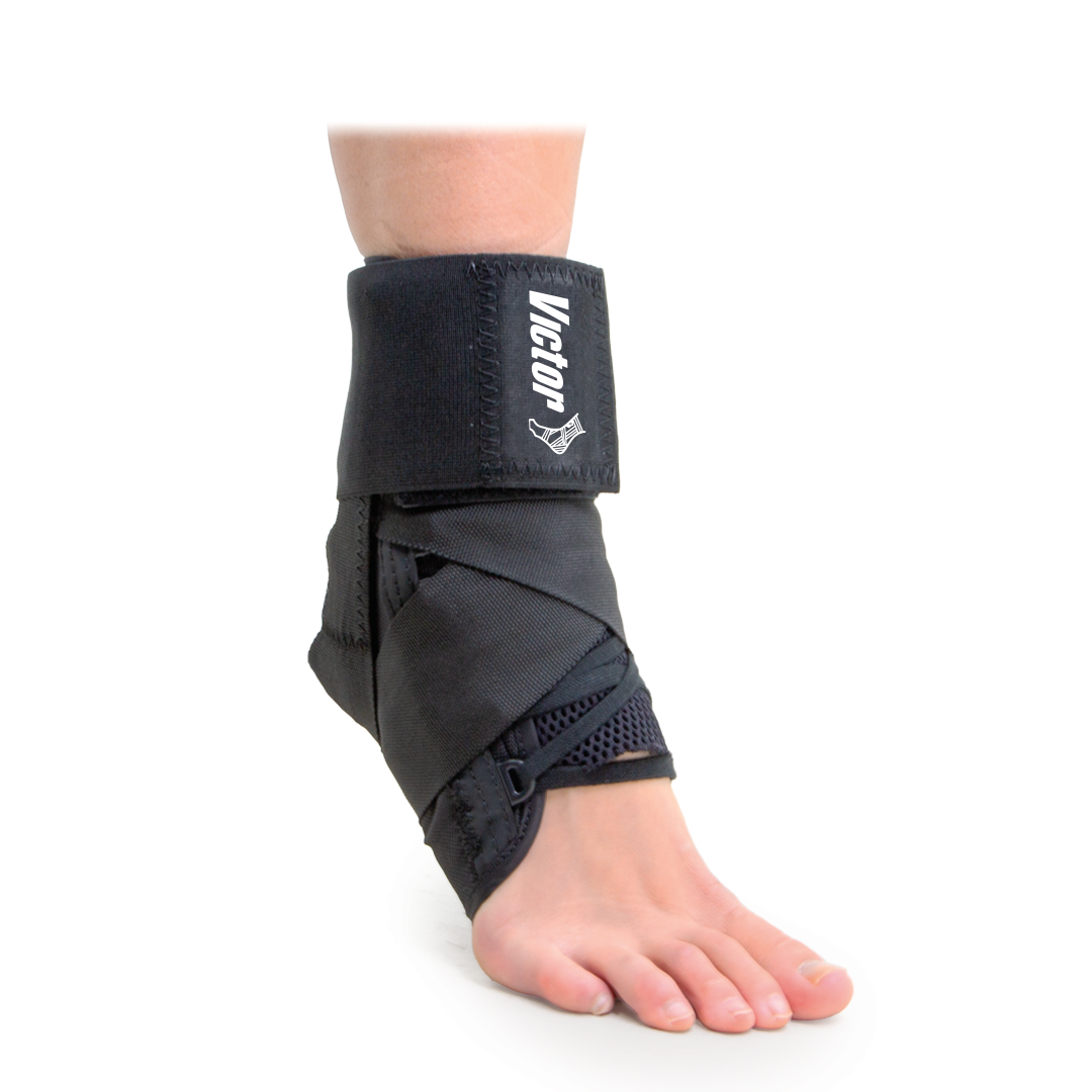 An ankle support brace with non-stretch figure-8 straps, shown in use on a person's ankle. The brace is black with the brand name 'Victor' visible on the strap.