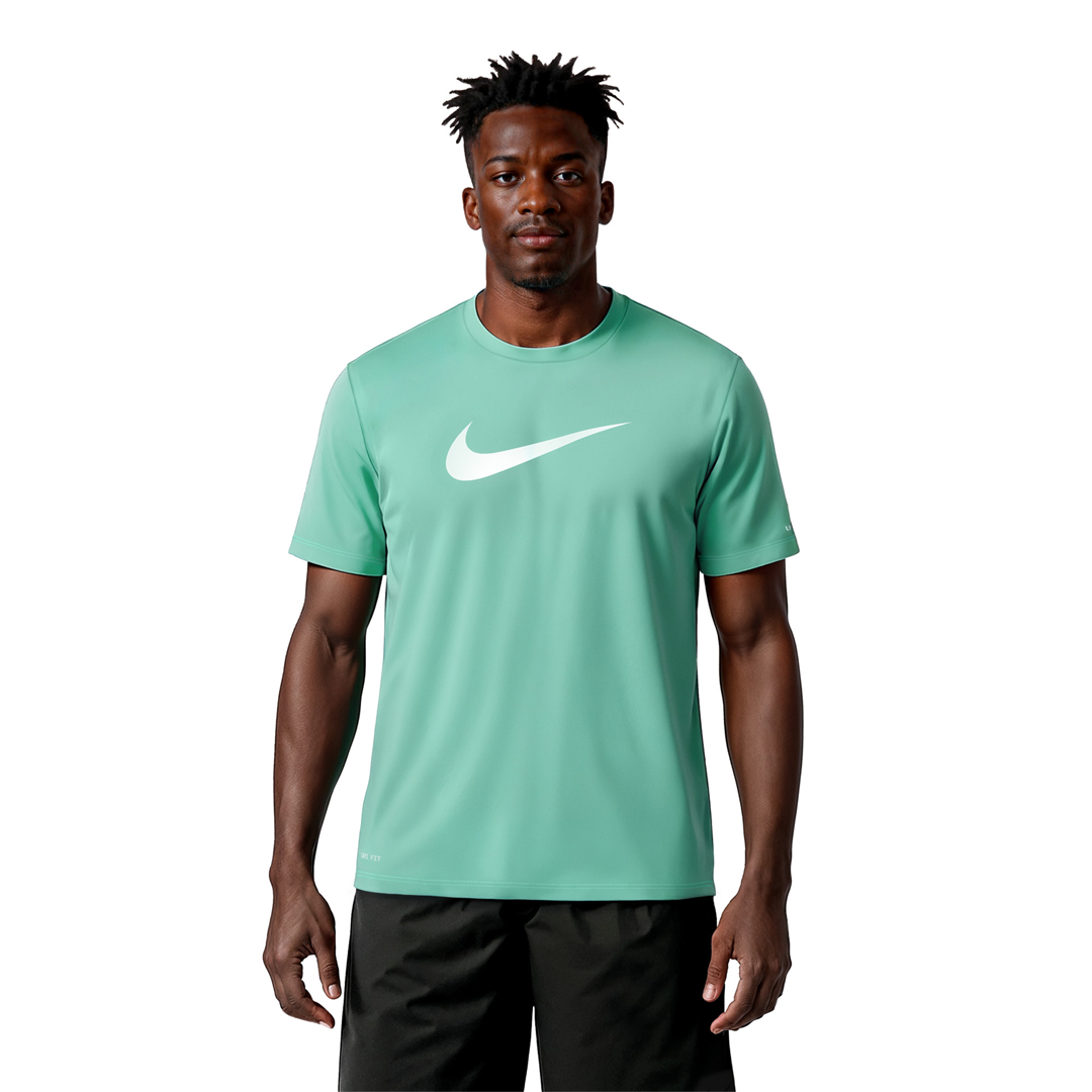 Man wearing a light blue Nike t-shirt with a white logo on a white background