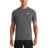 Man wearing a gray Nike t-shirt on a white background