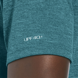 Teal athletic shirt with 'UPF 40+' text on a person wearing it.