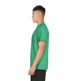 Person wearing a green athletic shirt on a white background