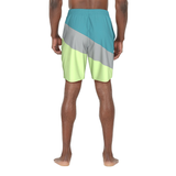 Color-blocked swim shorts worn by a person on a white background