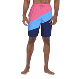 Color-blocked swim shorts with pink, blue, and navy sections on a white background