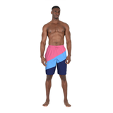 Man wearing a colorful two-tone swim shorts on a white background
