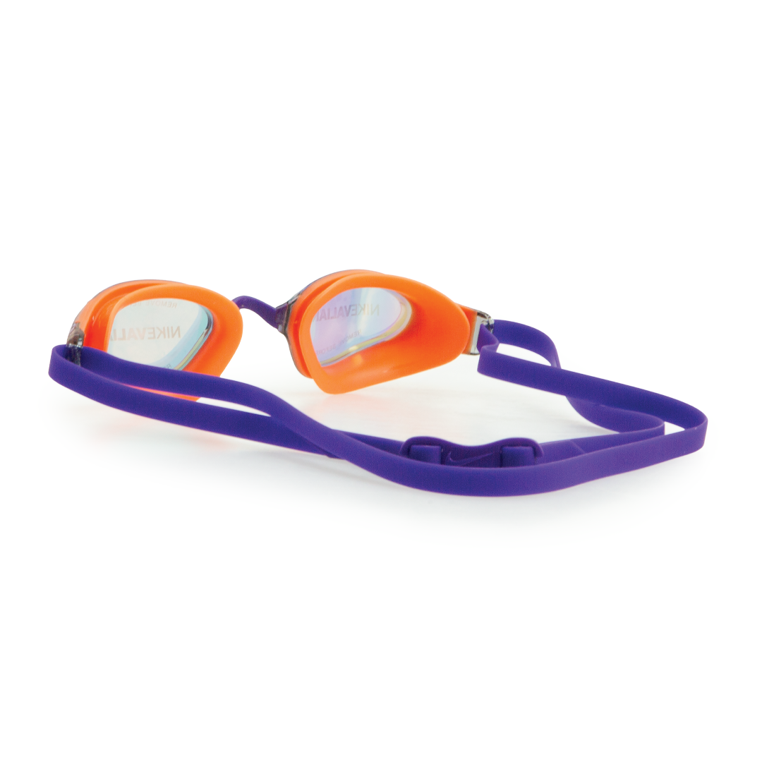 Orange and purple swim goggles on a white background