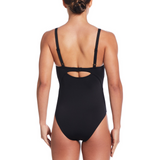 Black swimsuit with cut-out design on a white background