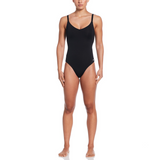 Person wearing a black swimsuit on a white background