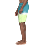 Person wearing a colorful swim short on a white background