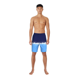 Man wearing blue and white tie-dye swim shorts on a white background