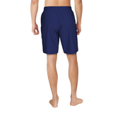 Person wearing navy blue swim shorts on a white background