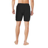 Person wearing black shorts on a white background