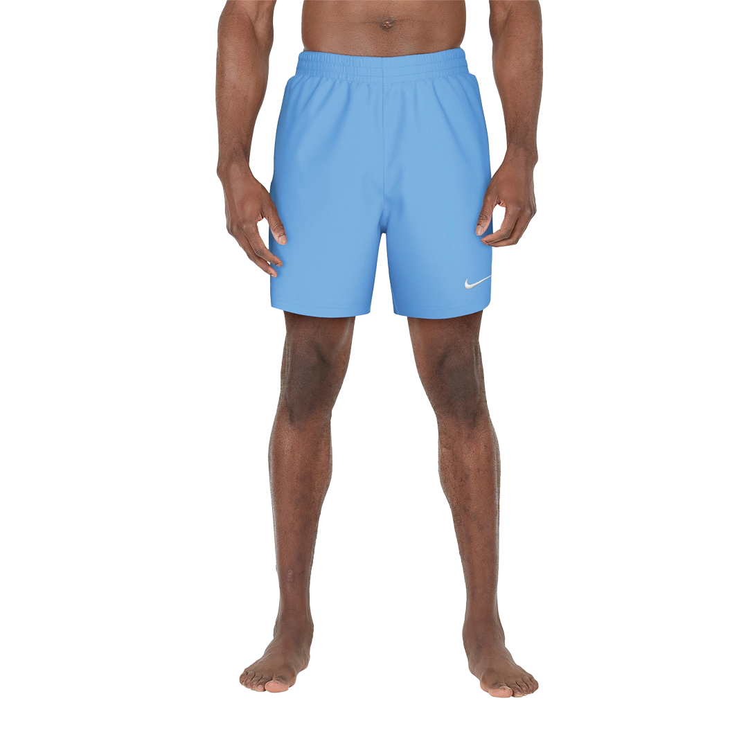 Man wearing blue shorts with a Nike logo on a white background