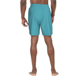 Person wearing teal swim shorts on a white background
