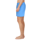 Person wearing blue shorts with a Nike logo on a white background
