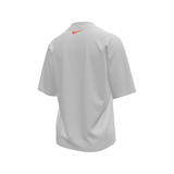 Gray t-shirt with a small orange logo on the chest against a white background